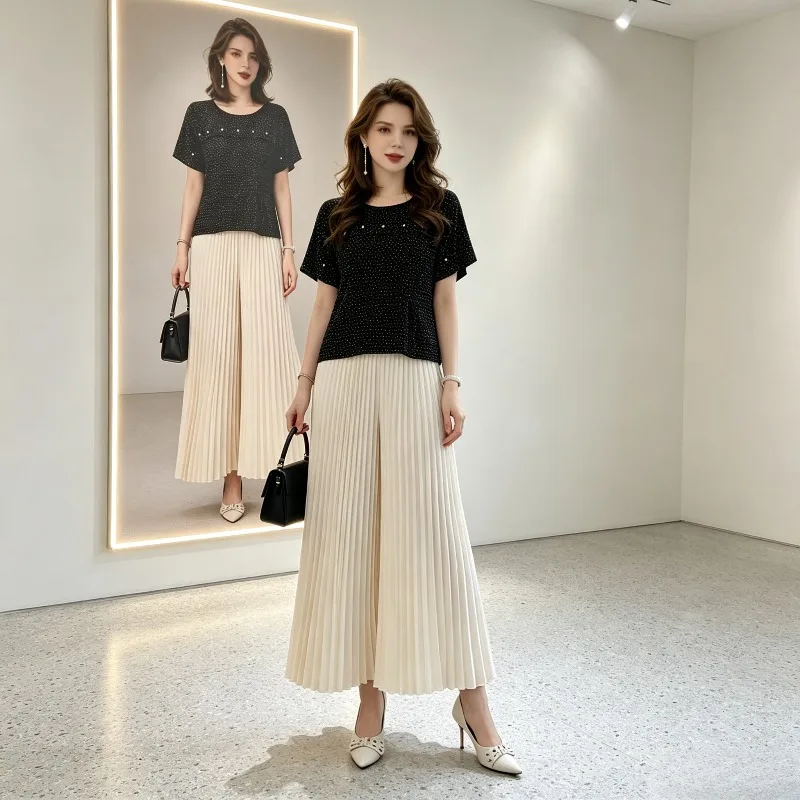 Miyake Pleated 2026 New Women's Summer Set Versatile Short Sleeve T-Shirt High Waist Wide Leg Pants Skirt Two-Piece Set Pleat
Miyake Pleated 2026 New Women's Summer Set Versatile Short Sleeve T-Shirt High Waist Wide Leg Pants Skirt Two-Piece Set Pleat