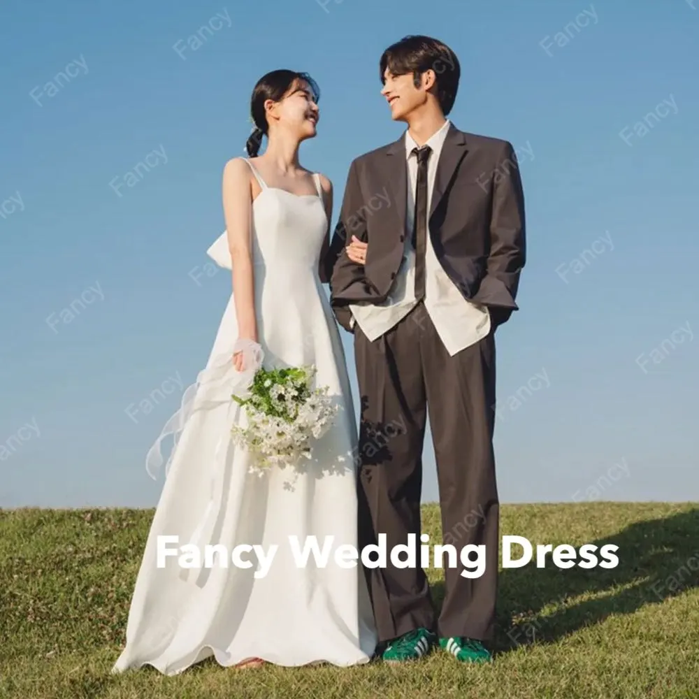 Fancy V Neck Spaghetti Straps Wedding Dress Korea Photo Shoot A Line Sleeveless Bridal Gown Big Bow Evening Dress customized
Fancy V Neck Spaghetti Straps Wedding Dress Korea Photo Shoot A Line Sleeveless Bridal Gown Big Bow Evening Dress customized