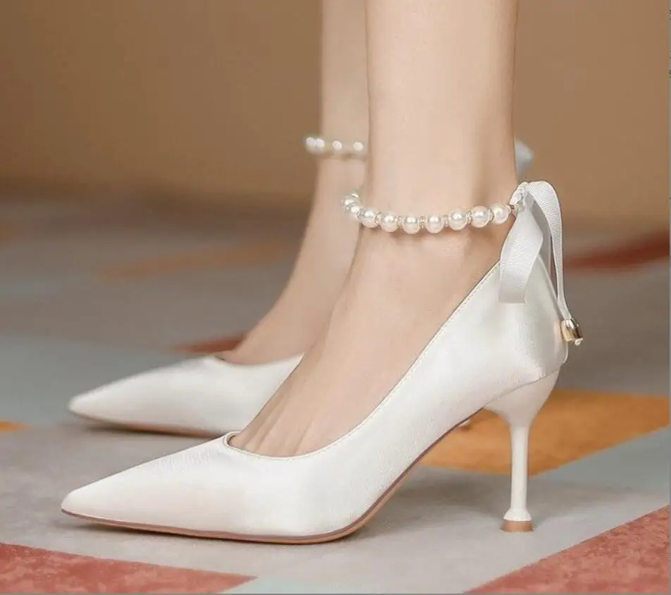 New Silk Ankle Pearl White Pumps Sexy High Heels Women Pumps Stiletto Sexy Bow Strap Dress Wedding Bride Shoes Shoes for Women
New Silk Ankle Pearl White Pumps Sexy High Heels Women Pumps Stiletto Sexy Bow Strap Dress Wedding Bride Shoes Shoes for Women