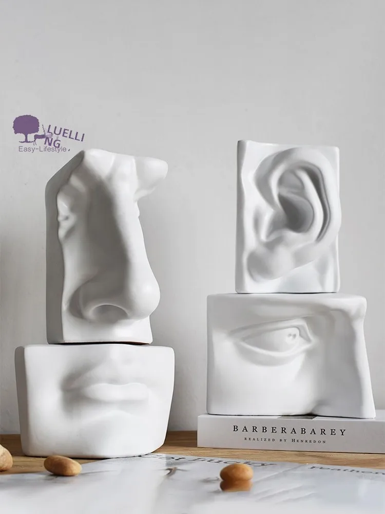 White Abstract Art Resin Sculpture Creative Decorative Figure Eyes Nose Mouth Ear Sculpture Home Decorations Nordic Style
White Abstract Art Resin Sculpture Creative Decorative Figure Eyes Nose Mouth Ear Sculpture Home Decorations Nordic Style