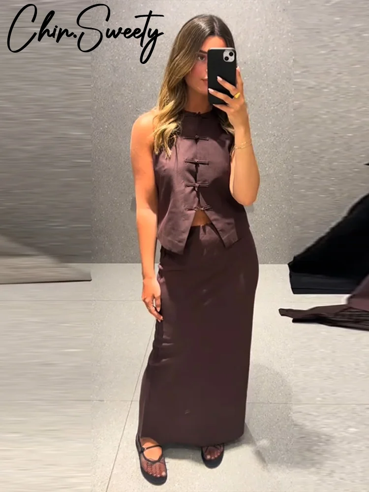 Элегантный однобортный жилет с длинной юбкой, женский однотонный топ без рукавов с круглым вырезом, тонкие юбки с высокой талией, модный женский костюм 2025 г.
Элегантный однобортный жилет с длинной юбкой, женский однотонный топ без рукавов с круглым вырезом, тонкие юбки с высокой талией, модный женский костюм 2025 г.