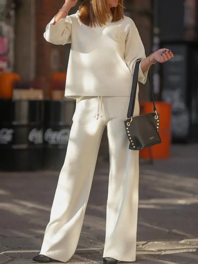 Новинка 2023 года, комплект из 2 предметов, вязаный пуловер с рукавами три четверти и высоким воротником, толстовка и повседневный комплект широких брюк с завязками на талии
Новинка 2023 года, комплект из 2 предметов, вязаный пуловер с рукавами три четверти и высоким воротником, толстовка и повседневный комплект широких брюк с завязками на талии