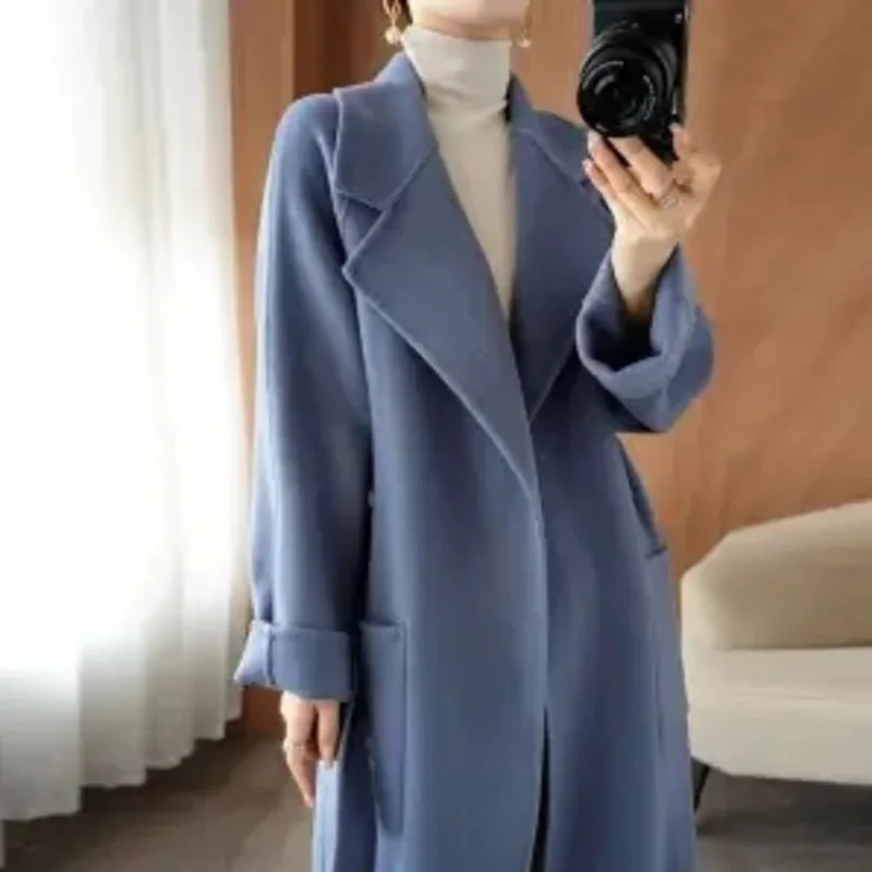 2023 New Autumn Winter Red Double-sided Wool Women's Coat Mid-length British Wool Fashion Pockets Loose Lace-up Suit Collar
2023 New Autumn Winter Red Double-sided Wool Women's Coat Mid-length British Wool Fashion Pockets Loose Lace-up Suit Collar