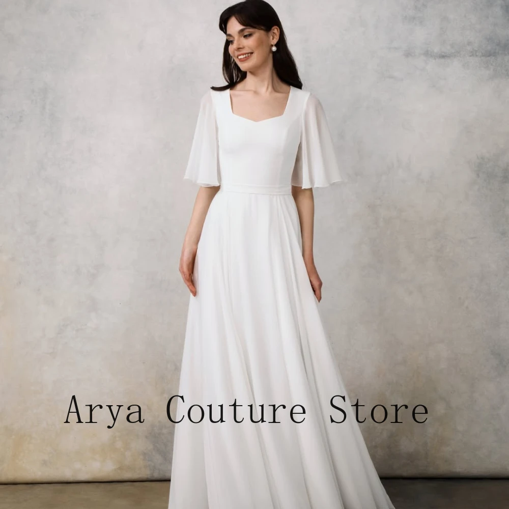 Customized 2026 White Chiffon Square Neck A-Line Gown – Flutter Sleeve Trailing Formal Maxi Dress for Wedding & Bridal Events
Customized 2026 White Chiffon Square Neck A-Line Gown – Flutter Sleeve Trailing Formal Maxi Dress for Wedding & Bridal Events