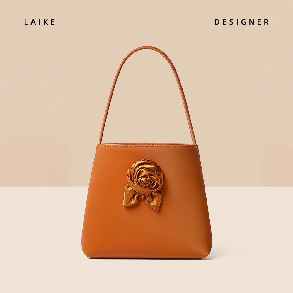 Bag women's new satin cowhide handbag niche high-end feeling wearing flower underarm shoulder bag Korean leather bag
Bag women's new satin cowhide handbag niche high-end feeling wearing flower underarm shoulder bag Korean leather bag