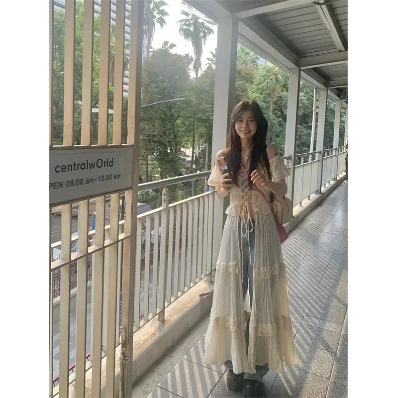 Sweet Ruffles Dress Women Y2K Slash Neck Bandage Robe Vintage Streetwear Hollow Out Dresses Korean Tunic Maxi Vestidos E7174
Sweet Ruffles Dress Women Y2K Slash Neck Bandage Robe Vintage Streetwear Hollow Out Dresses Korean Tunic Maxi Vestidos E7174
