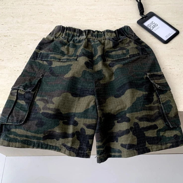 Pants 2026 Spring and Summer New Childrens Clothing Korean Style Boys and Girls Camouflage Pocket Cargo Five Minute Pants
Pants 2026 Spring and Summer New Childrens Clothing Korean Style Boys and Girls Camouflage Pocket Cargo Five Minute Pants