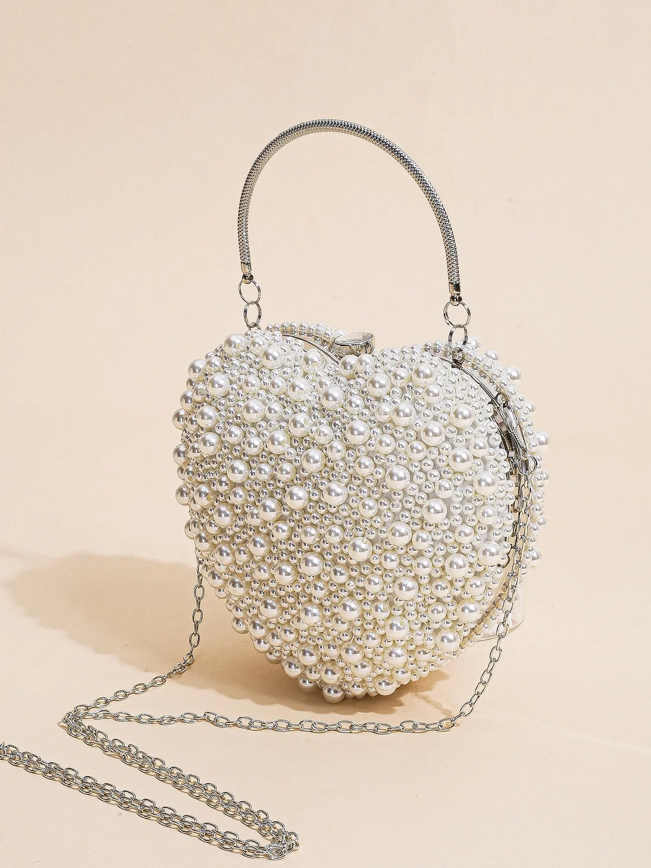 Мини-клатч в форме сердца с жемчугом и бисером, элегантная банкетная сумочка, женская классическая сумочка для свадебной вечеринки, выпускного вечера
Мини-клатч в форме сердца с жемчугом и бисером, элегантная банкетная сумочка, женская классическая сумочка для свадебной вечеринки, выпускного вечера