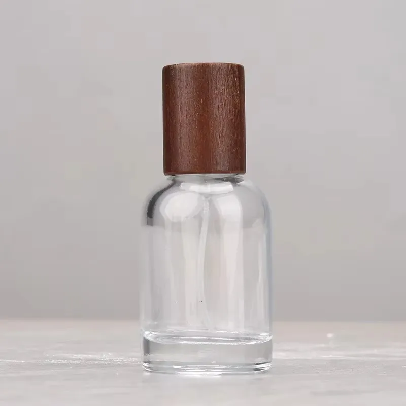 60pcs 30ml/50ml Round Glass Perfume Bottle Clear Spray Bottles With Walnut Lid Refillable Atomizer Travel Cosmetic Container
60pcs 30ml/50ml Round Glass Perfume Bottle Clear Spray Bottles With Walnut Lid Refillable Atomizer Travel Cosmetic Container