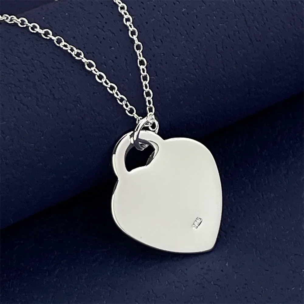 Ожерелье с подвеской из стерлингового серебра 925 пробы с замком любви, женская пара, простой роскошный банкет, свадьба, день рождения, ювелирное изделие, подарок
Ожерелье с подвеской из стерлингового серебра 925 пробы с замком любви, женская пара, простой роскошный банкет, свадьба, день рождения, ювелирное изделие, подарок