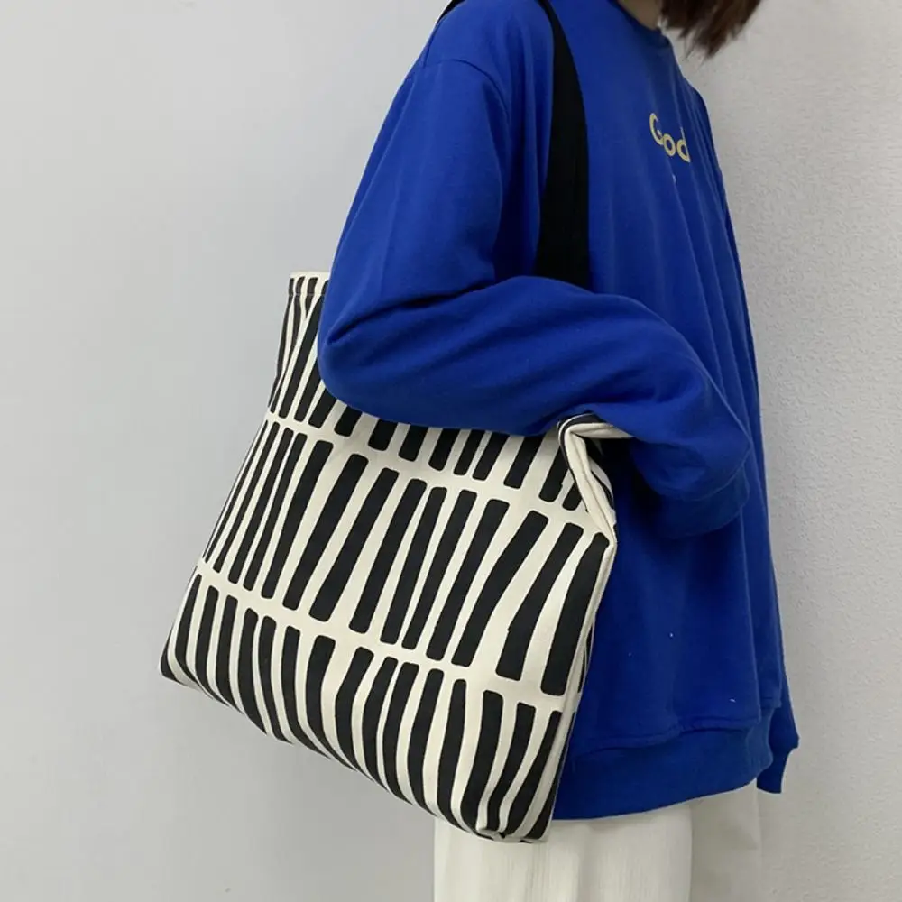 Simple Line Print Canvas Tote Bag Cloth Zipper Large Capacity Tote Bag Shoulder Bag Mommy Bag Reusable Shopping Bag Shopping
Simple Line Print Canvas Tote Bag Cloth Zipper Large Capacity Tote Bag Shoulder Bag Mommy Bag Reusable Shopping Bag Shopping
