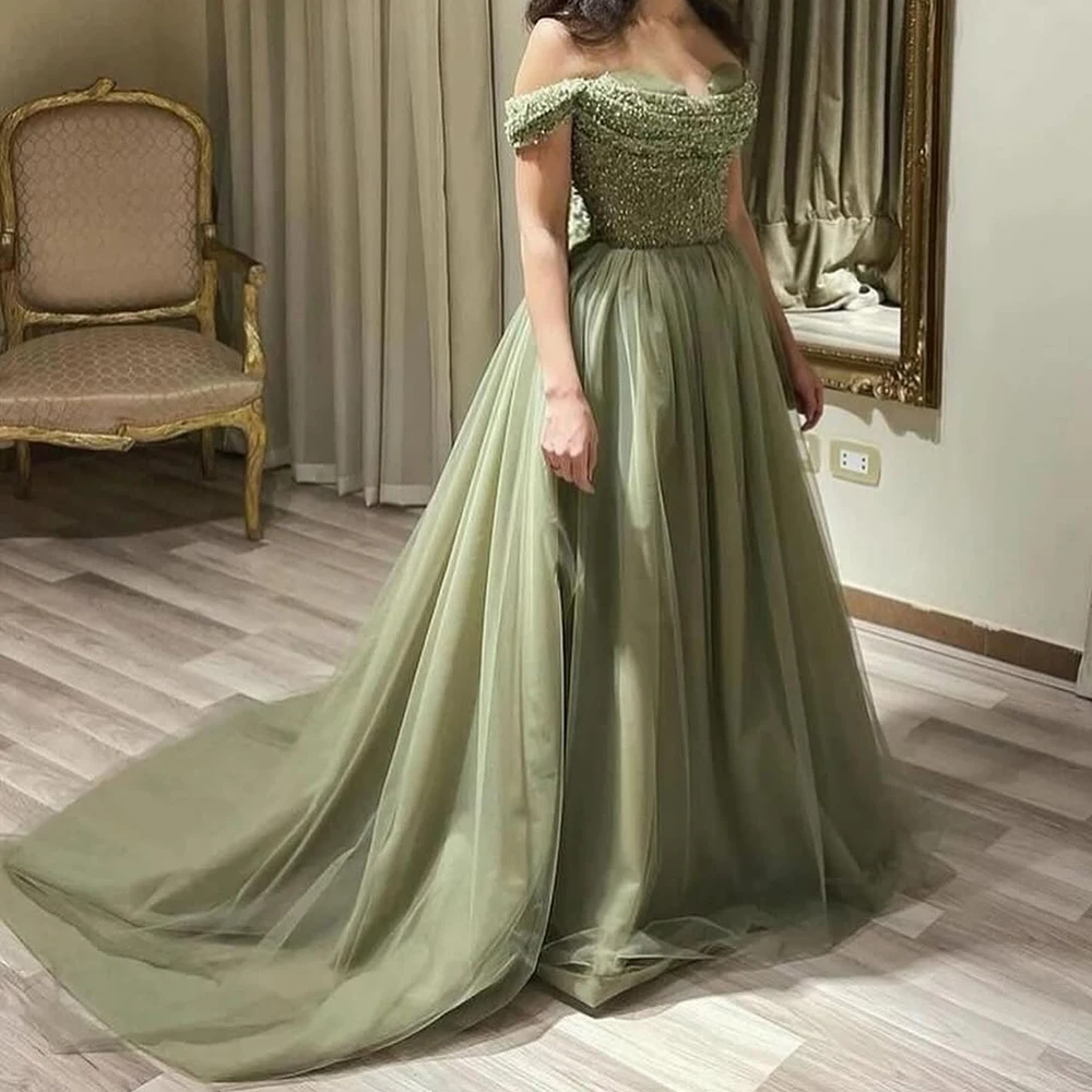 Customized Tulle Green A-line Evening Dress Strapless Draped Sequined Prom Dress Sleeveless Beading Floor Length Party Gown 
Customized Tulle Green A-line Evening Dress Strapless Draped Sequined Prom Dress Sleeveless Beading Floor Length Party Gown
