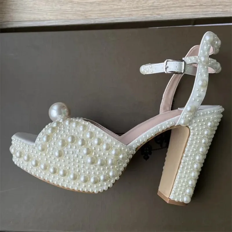 Fully Handmade Luxury Pearls Thick Heeled Peep toe Women Sandals Summer Fashion Platform Wedges High heels Wedding Banquet Shoes
Fully Handmade Luxury Pearls Thick Heeled Peep toe Women Sandals Summer Fashion Platform Wedges High heels Wedding Banquet Shoes