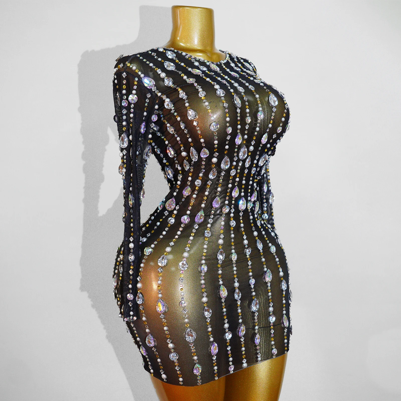 Luxurious New Shiny Rhinestone Black Dress See-Through Mesh High Stretch Birthday Celebration Dress Dinner Singer Stage Costume
Luxurious New Shiny Rhinestone Black Dress See-Through Mesh High Stretch Birthday Celebration Dress Dinner Singer Stage Costume