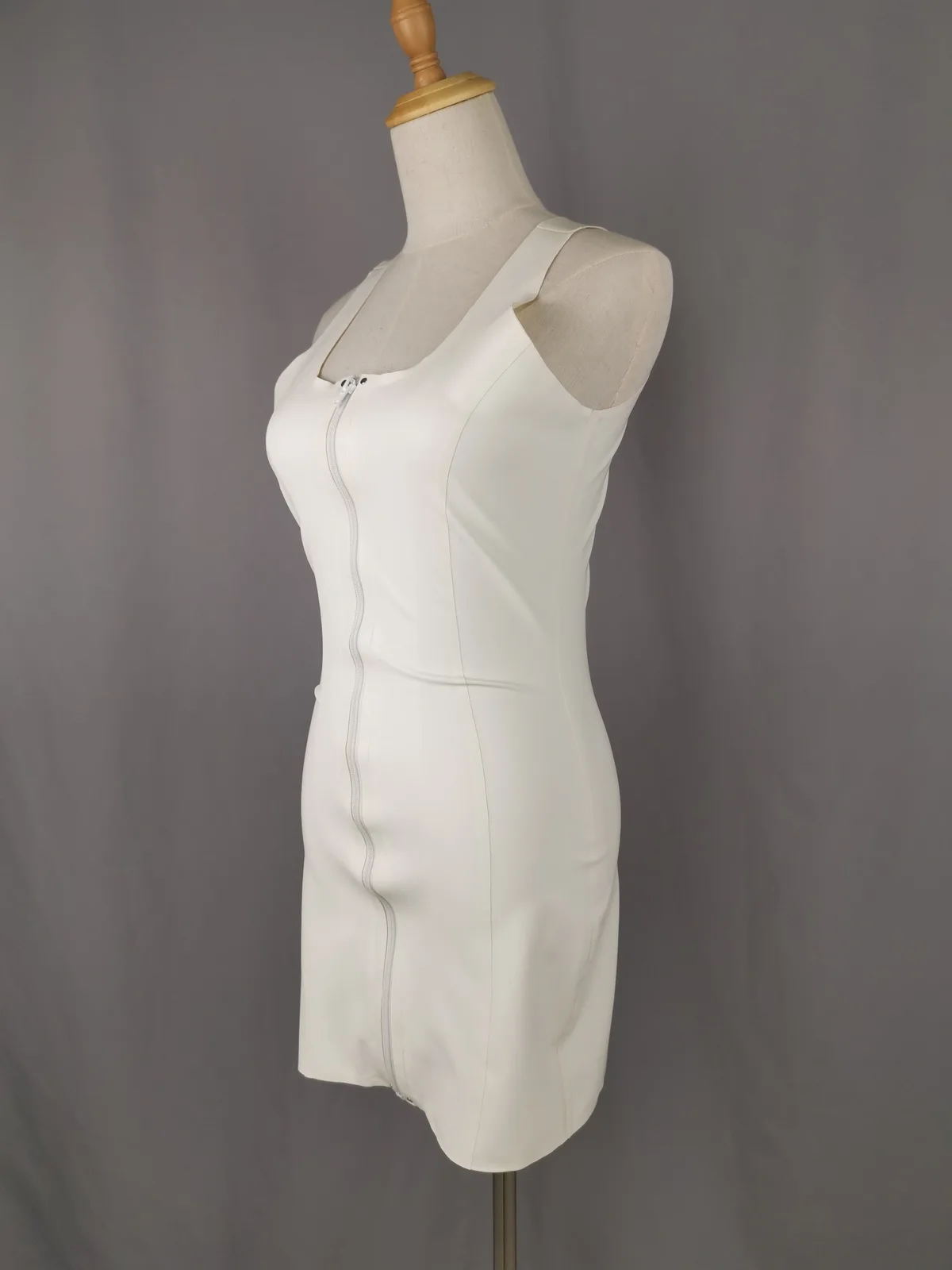 Women's ultra-short vest dress in white. Front zipper. Detailed description includes sizes. (instock)
Women's ultra-short vest dress in white. Front zipper. Detailed description includes sizes. (instock)