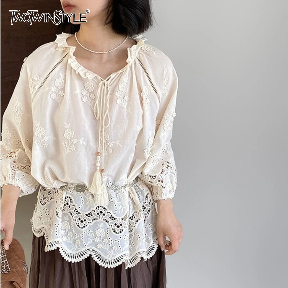 TWOTWINSTYLE Solid Hollow Out Spliced Lace Up Loose Blouses for Women O Neck Long Sleeve Temperament Shirts Female New
TWOTWINSTYLE Solid Hollow Out Spliced Lace Up Loose Blouses for Women O Neck Long Sleeve Temperament Shirts Female New