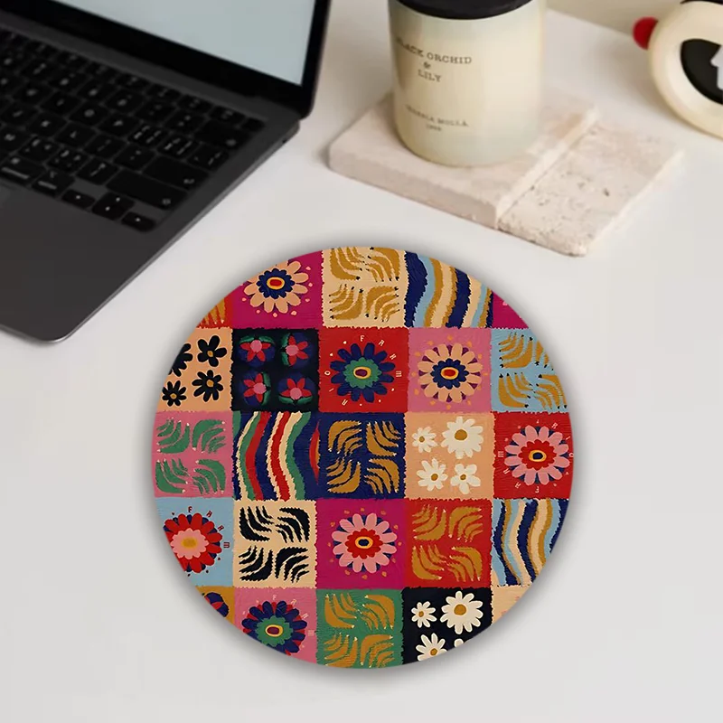 The Bohemian floral round mouse pad with anti-slip rubber and colorful design is suitable for both office and home use
The Bohemian floral round mouse pad with anti-slip rubber and colorful design is suitable for both office and home use