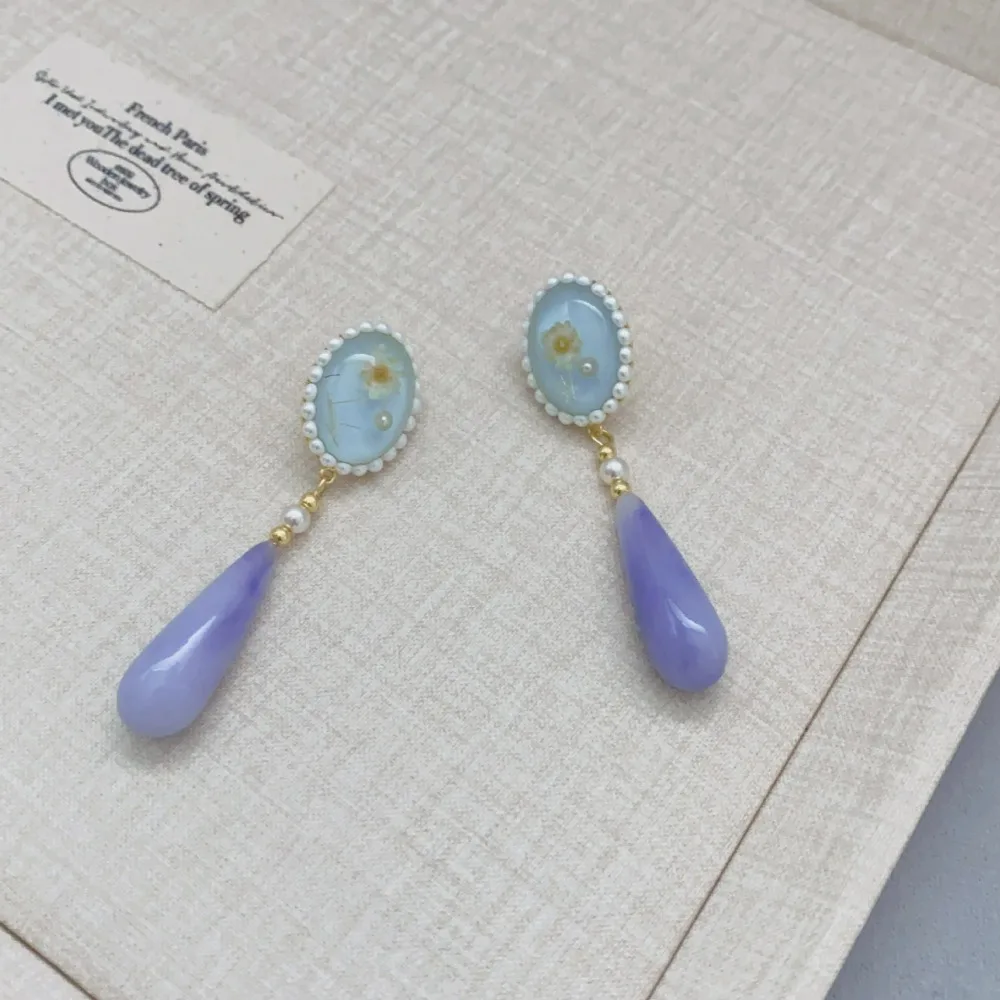New Retro Personalized Real Flower Poured Drop-shaped Resin Light Purple Water Drop Pendant Versatile Earrings Gentle Jewelry
New Retro Personalized Real Flower Poured Drop-shaped Resin Light Purple Water Drop Pendant Versatile Earrings Gentle Jewelry