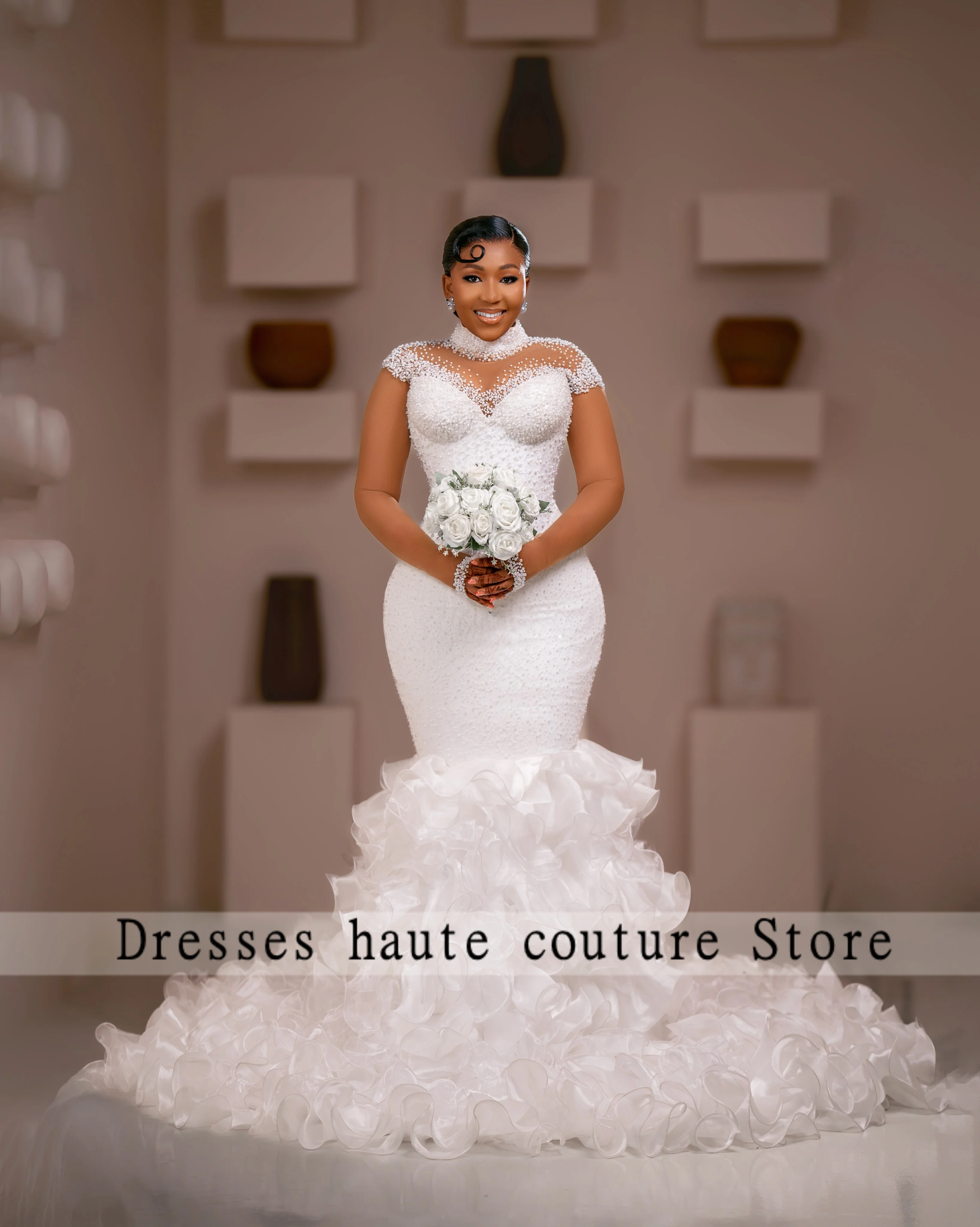 High Neck Beaded Mermaid Wedding Dress 2026 Ruffles Organza Train Bridal Gown For Black Women Vestido De Novia Customized
High Neck Beaded Mermaid Wedding Dress 2026 Ruffles Organza Train Bridal Gown For Black Women Vestido De Novia Customized