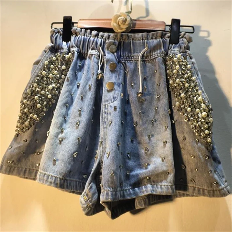 Summer pocket pearl elastic waist short fashion women's pants new diamond beaded high waist wide leg denim pants
Summer pocket pearl elastic waist short fashion women's pants new diamond beaded high waist wide leg denim pants