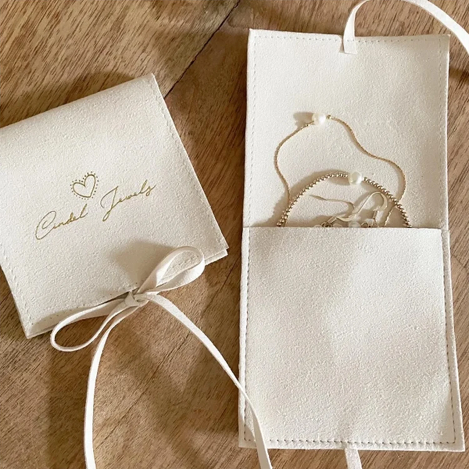 50pcs custom jewelry pouch personalized deboss bag chic small jewerly packaging pouch microfiber suede pouch bag
50pcs custom jewelry pouch personalized deboss bag chic small jewerly packaging pouch microfiber suede pouch bag