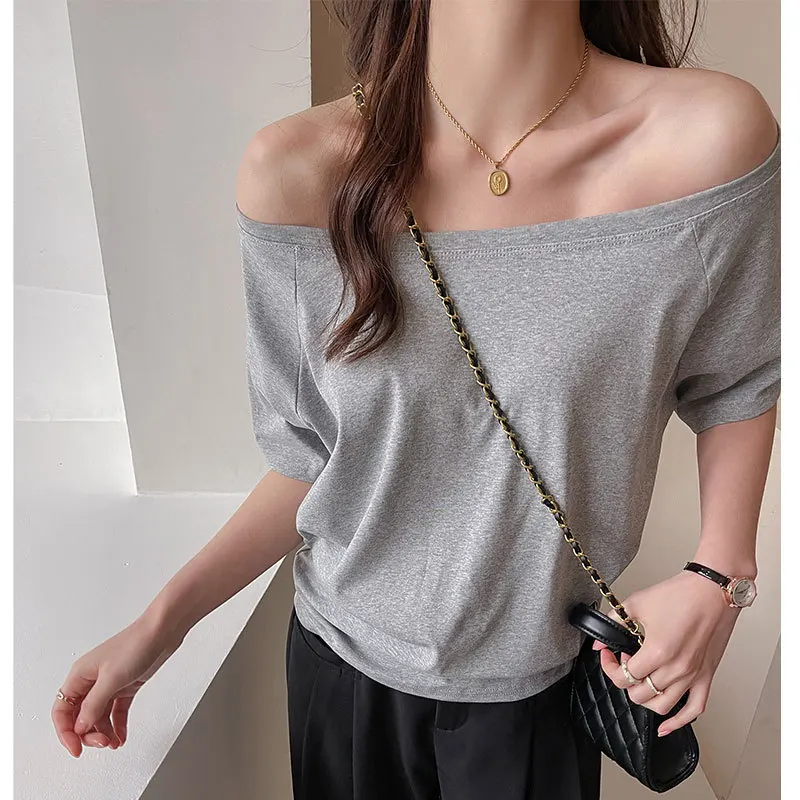 off shoulder Gray modal slanted one-word collar top women's summer Korean loose and thin short-sleeved t-shirt bottoming shir
off shoulder Gray modal slanted one-word collar top women's summer Korean loose and thin short-sleeved t-shirt bottoming shir