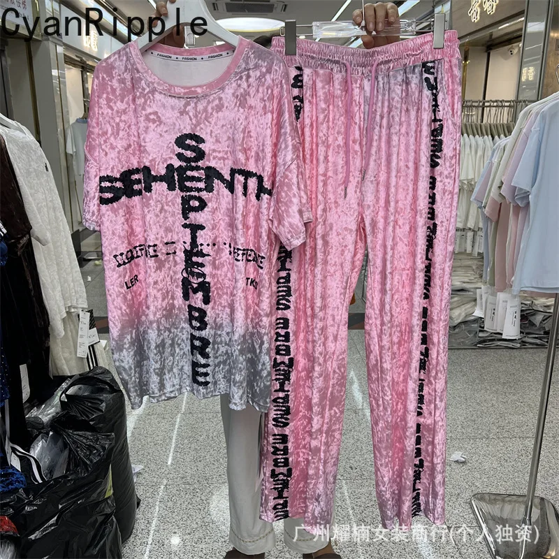 2026 New Fashion Summer Women Two-piece Set Letters Printed Loose Short Sleeve T-shirt Top + Elastic Waist Casual Straight Pants
2026 New Fashion Summer Women Two-piece Set Letters Printed Loose Short Sleeve T-shirt Top + Elastic Waist Casual Straight Pants