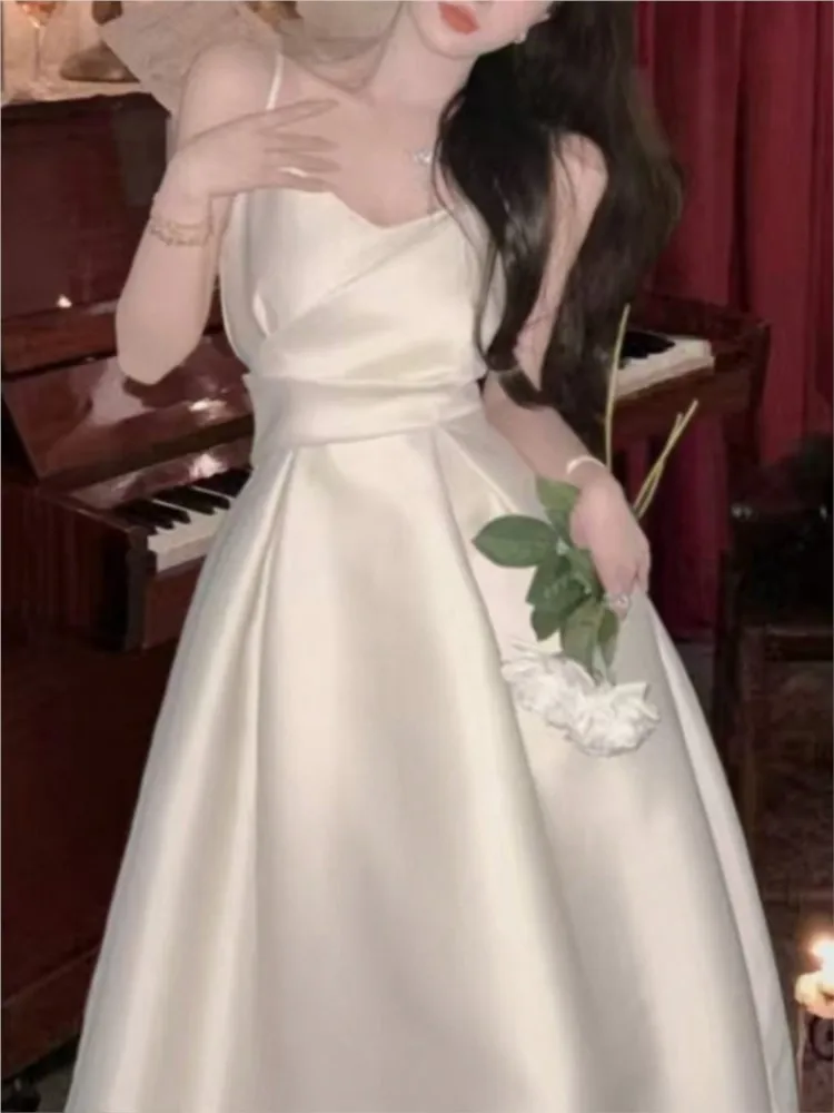 French Simple Slim Satin Sling Light Wedding Dress Women Fashion Chic Solid Graduation Dresses Summer Backless Vestidos Clothes
French Simple Slim Satin Sling Light Wedding Dress Women Fashion Chic Solid Graduation Dresses Summer Backless Vestidos Clothes