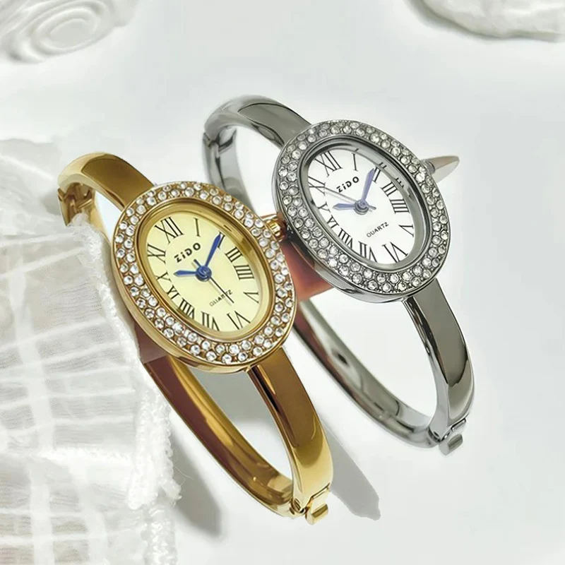 Золотые часы известного бренда, модные женские часы с овальным циферблатом и стразами, кварцевые часы с браслетом, роскошные наручные часы, подарочные часы, дропшиппинг
Золотые часы известного бренда, модные женские часы с овальным циферблатом и стразами, кварцевые часы с браслетом, роскошные наручные часы, подарочные часы, дропшиппинг