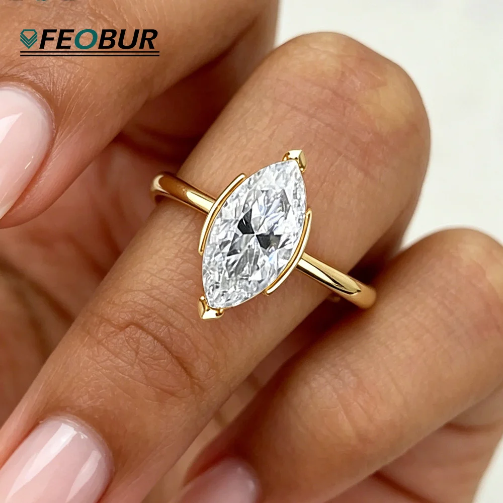 Half Bezel Set Marquise Moissanite Solitaire Ring For Women 18k Gold Plated 3CT Lab Diamond Engagement Band 925 Sterling Silver
Half Bezel Set Marquise Moissanite Solitaire Ring For Women 18k Gold Plated 3CT Lab Diamond Engagement Band 925 Sterling Silver
