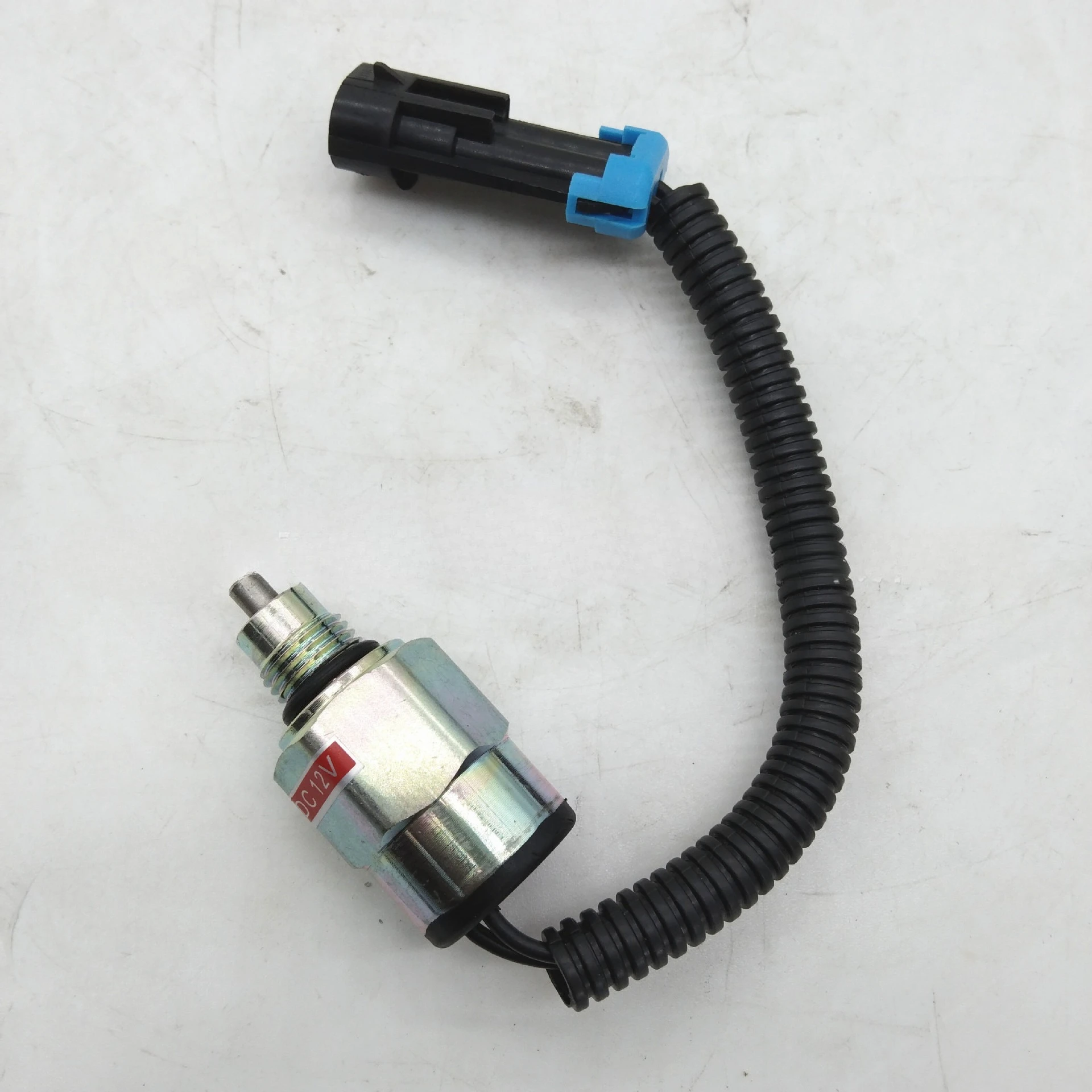 84128131 Flame Out Solenoid Valve 12V for Backhoe Loader Engine 410 435 440 L190
84128131 Flame Out Solenoid Valve 12V for Backhoe Loader Engine 410 435 440 L190