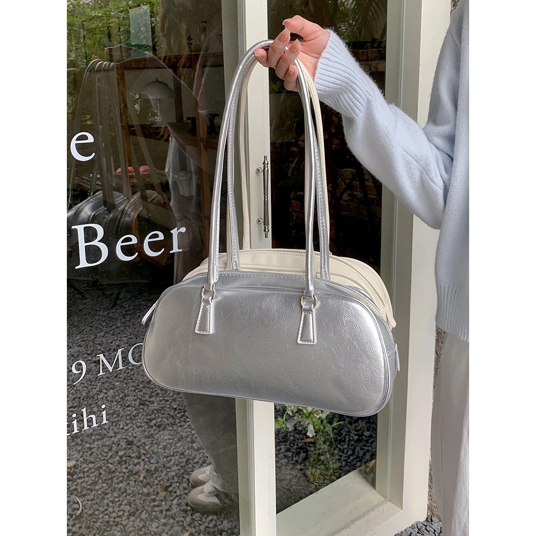 Повседневная серебряная женская сумка в Корейском стиле, балетная модная универсальная весенняя новая модель, сумка для подмышек, модная сумка на плечо
Повседневная серебряная женская сумка в Корейском стиле, балетная модная универсальная весенняя новая модель, сумка для подмышек, модная сумка на плечо