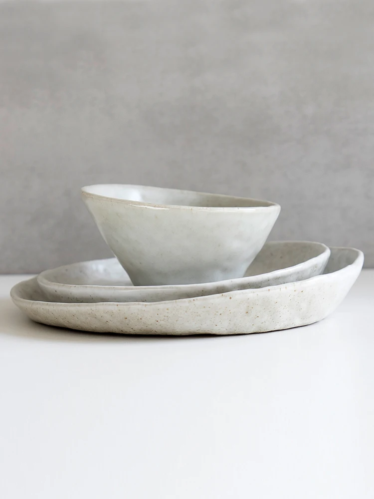 Handmade Japanese Style Irregular Shaped Ceramic Plate Large And Small Sizes Artistic Retro Tray Dishware from Jingdezhen
Handmade Japanese Style Irregular Shaped Ceramic Plate Large And Small Sizes Artistic Retro Tray Dishware from Jingdezhen