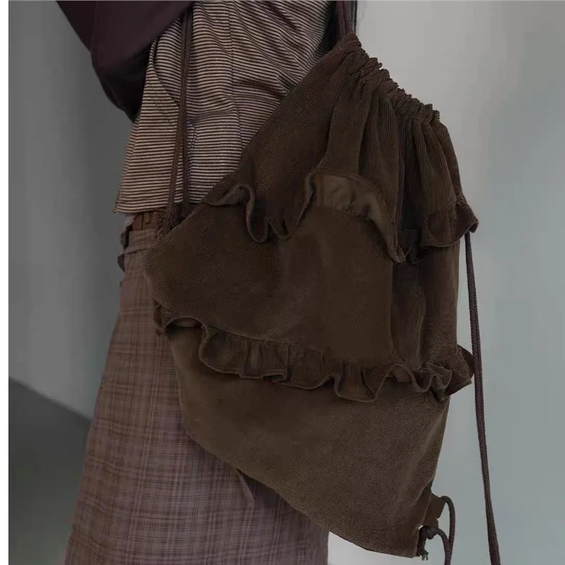 Early Spring New Korean Style Corduroy Pleated Lace Trim Drawstring Backpack Lightweight Artistic Double Shoulder Bag
Early Spring New Korean Style Corduroy Pleated Lace Trim Drawstring Backpack Lightweight Artistic Double Shoulder Bag