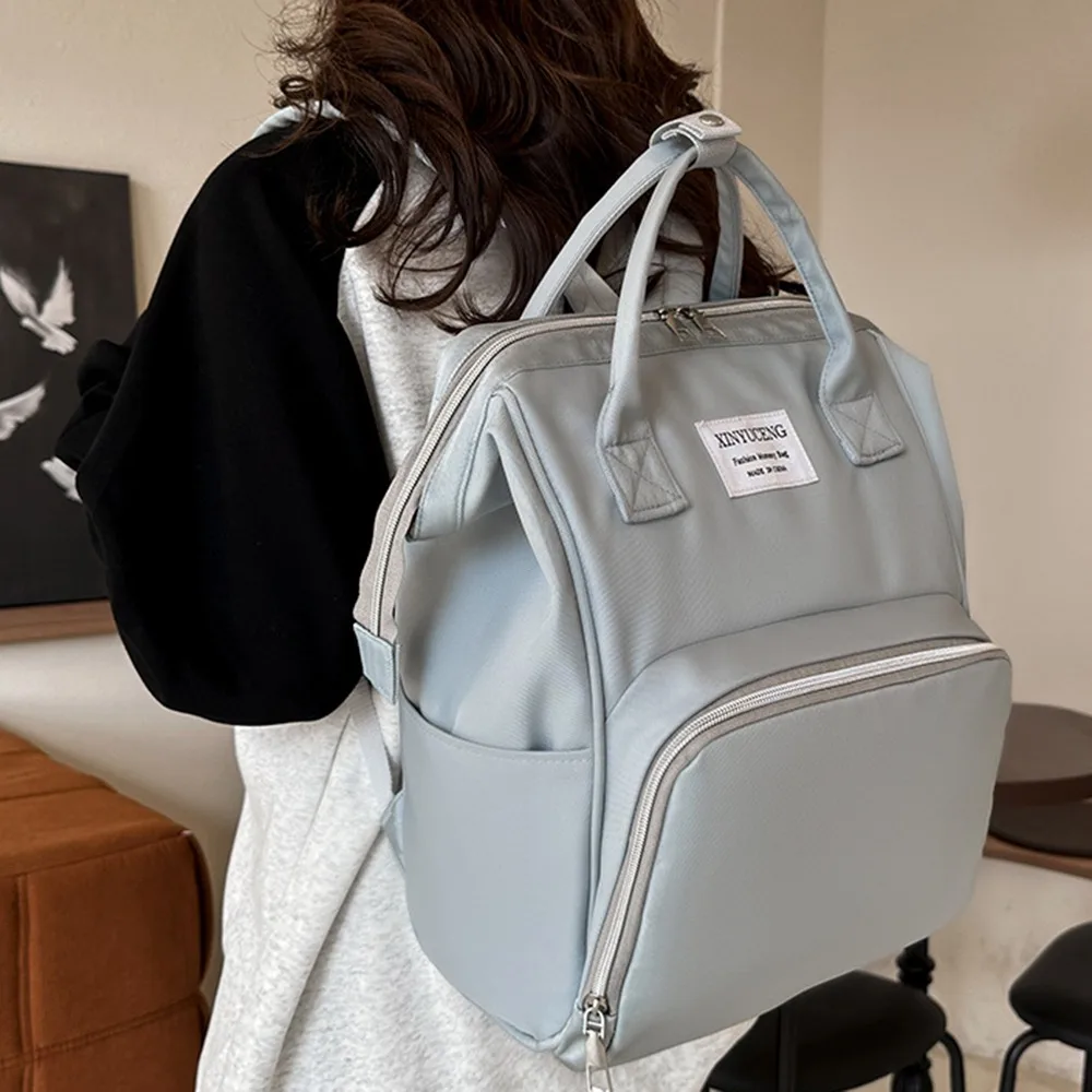 Cute Multifunctional Mommy Backpack Large Capacity Solid Color Baby Diaper Bag Portable Oxford Cloth Mommy Shoulder Bag Outdoor
Cute Multifunctional Mommy Backpack Large Capacity Solid Color Baby Diaper Bag Portable Oxford Cloth Mommy Shoulder Bag Outdoor