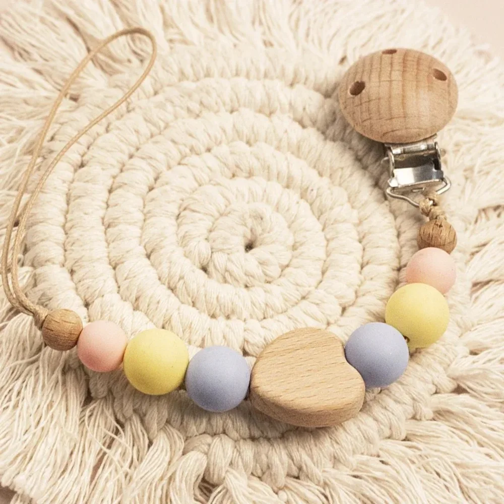 High Quality Silicone Pacifier Clips Anti-drop Lightweight Teether Teething Wooden Gift Soother Clip Chain Newborn
High Quality Silicone Pacifier Clips Anti-drop Lightweight Teether Teething Wooden Gift Soother Clip Chain Newborn