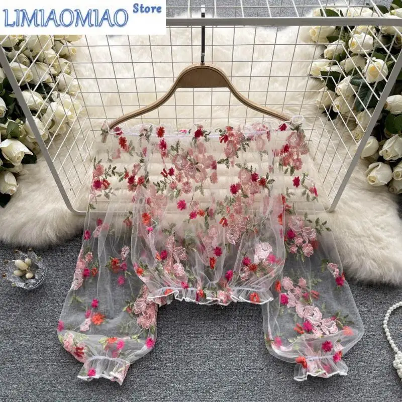 Сетчатая рубашка на одно плечо с вышивкой, женская свободная верхняя рубашка с пышными рукавами, короткая блузка, кружевная рубашка с длинными рукавами 
Сетчатая рубашка на одно плечо с вышивкой, женская свободная верхняя рубашка с пышными рукавами, короткая блузка, кружевная рубашка с длинными рукавами