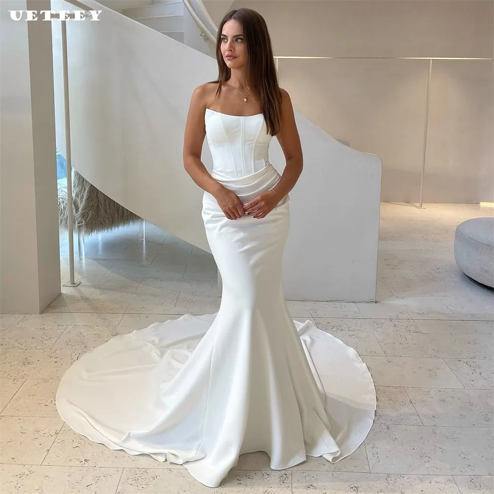 UETEEY Customized Formal Sleeveless Strapless Pleats Crepe Mermaid Wedding Dress For Women Zipper Back Court Train Bridal Gown
UETEEY Customized Formal Sleeveless Strapless Pleats Crepe Mermaid Wedding Dress For Women Zipper Back Court Train Bridal Gown
