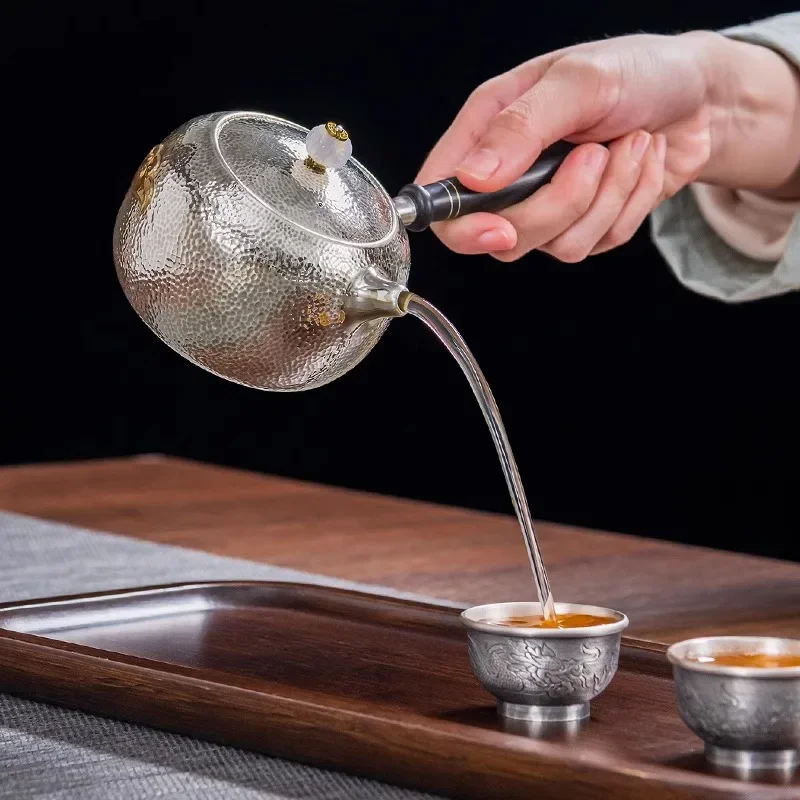 Side handle silver teapot, pure silver 99.9%, handcrafted Xiangyun gold-plated tea set, brewing teapot
Side handle silver teapot, pure silver 99.9%, handcrafted Xiangyun gold-plated tea set, brewing teapot
