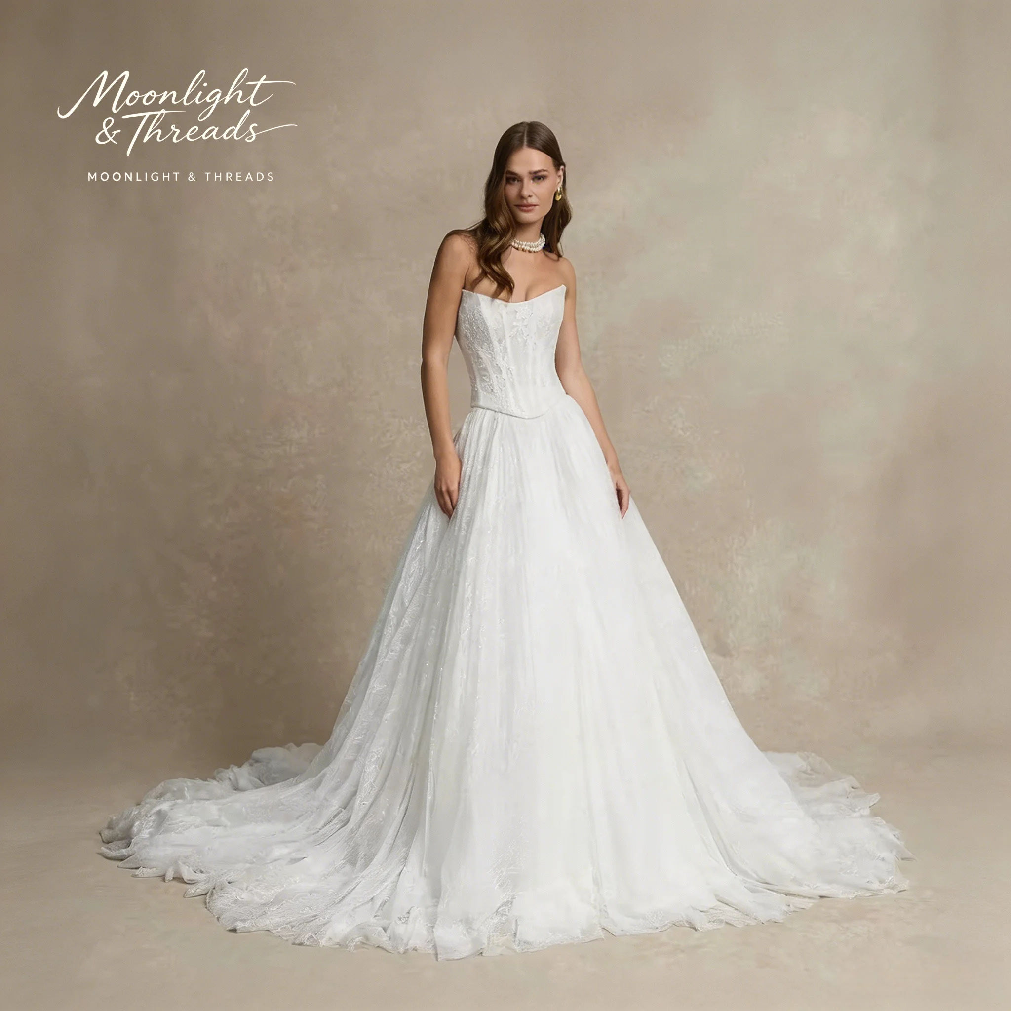 White strapless sleeveless floor-length formal wedding gown featuring an A-line skirt embroidery and internal boning
White strapless sleeveless floor-length formal wedding gown featuring an A-line skirt embroidery and internal boning