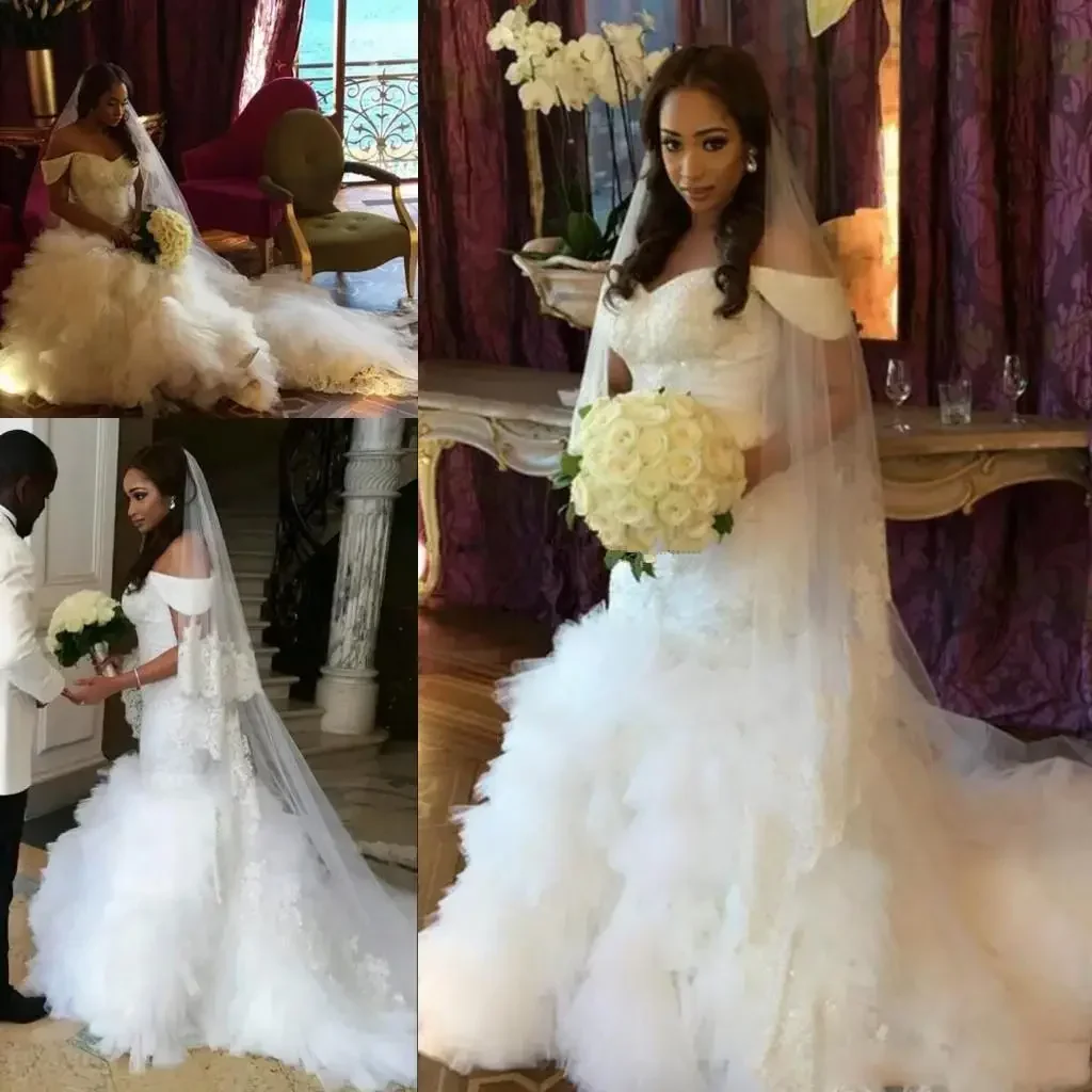 Customized African Off-Shoulder Mermaid Beaded Appliques Bridal Dresses Plus Size Tiered Ruffles Wedding Gowns For Brides
Customized African Off-Shoulder Mermaid Beaded Appliques Bridal Dresses Plus Size Tiered Ruffles Wedding Gowns For Brides