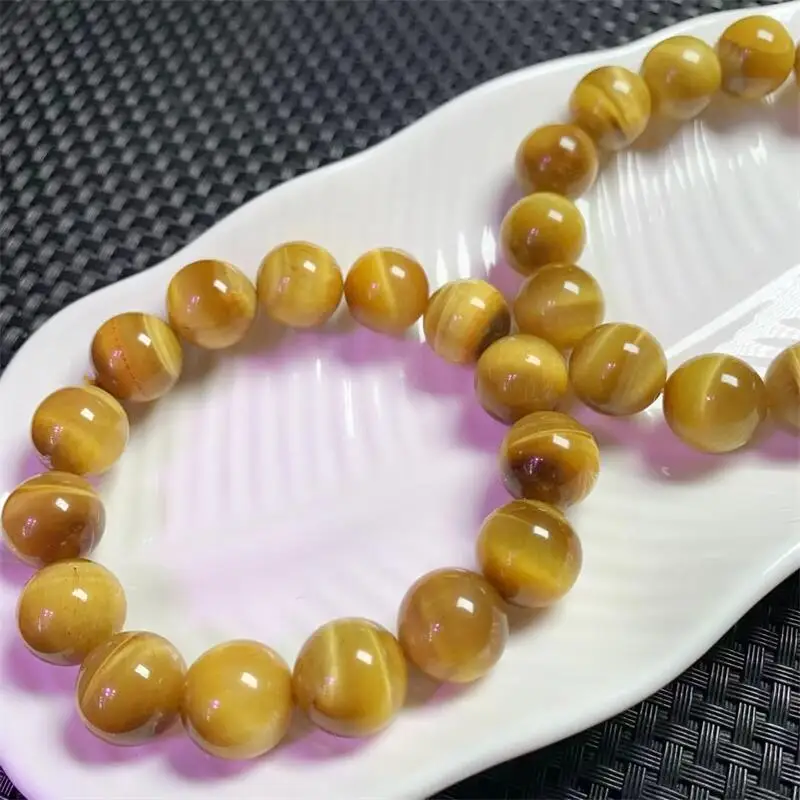 14 мм натуральный золотой тигровый глаз камень браслет женский красивый красочный кристалл энергия исцеление модные ювелирные изделия из драгоценных камней 1 шт.
14 мм натуральный золотой тигровый глаз камень браслет женский красивый красочный кристалл энергия исцеление модные ювелирные изделия из драгоценных камней 1 шт.