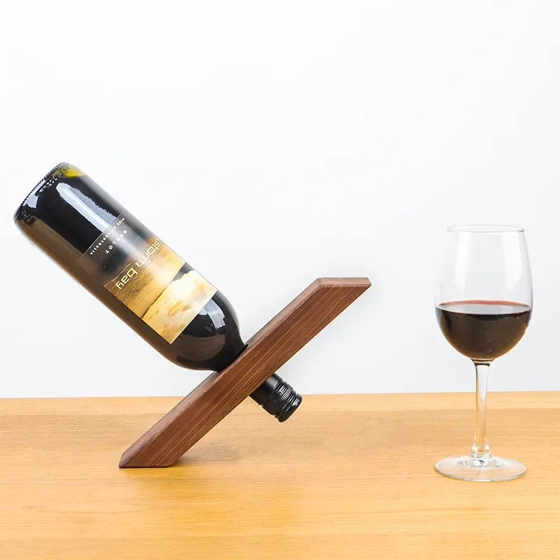 Solid Wood Pivot Suspension Wine Rack Household Ornament Creative Solid Wood Personalized Display Rack Storage Wine Bottle
Solid Wood Pivot Suspension Wine Rack Household Ornament Creative Solid Wood Personalized Display Rack Storage Wine Bottle