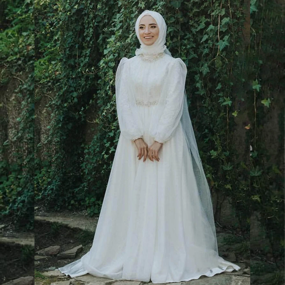 Muslim Wedding Dresses with Hijab High Neck Long Sleeve A-Line Beading Garden Beach Bridal Gown Customized vestidos de novia
Muslim Wedding Dresses with Hijab High Neck Long Sleeve A-Line Beading Garden Beach Bridal Gown Customized vestidos de novia