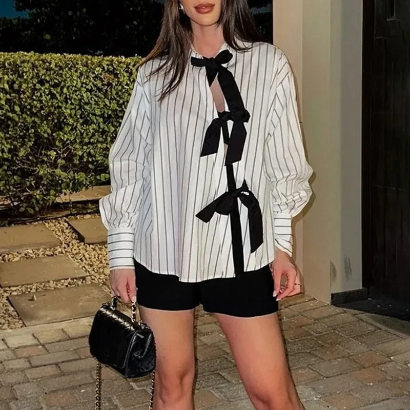 BKQU Women Striped Shirt Bow Lace-up Fashion Lapel Long Sleeve Hollow Loose Blouses 2026 New Chic High Street Elegant Tops
BKQU Women Striped Shirt Bow Lace-up Fashion Lapel Long Sleeve Hollow Loose Blouses 2026 New Chic High Street Elegant Tops