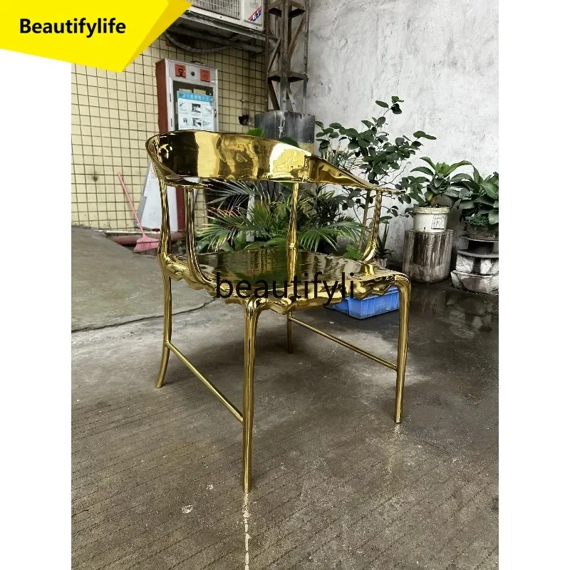 Light luxury brass cast dining chair creative backrest armchair Nordic fashion popular furniture
Light luxury brass cast dining chair creative backrest armchair Nordic fashion popular furniture