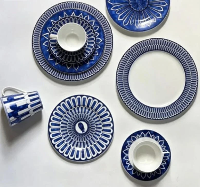 Blue Print Bone China Western Dinner Plate and Coffee Cup Saucer Set Ideal for Home Dining Table Decoration and Daily Use
Blue Print Bone China Western Dinner Plate and Coffee Cup Saucer Set Ideal for Home Dining Table Decoration and Daily Use