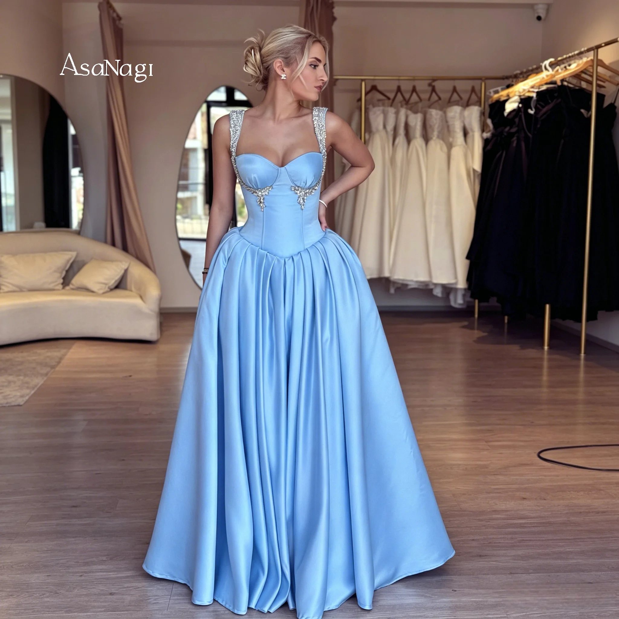 Floor Length Formal Gown: Blue Strappy Strapless Sleeveless and Voluminous Skirt Design with Draping and Beaded Embellishment
Floor Length Formal Gown: Blue Strappy Strapless Sleeveless and Voluminous Skirt Design with Draping and Beaded Embellishment