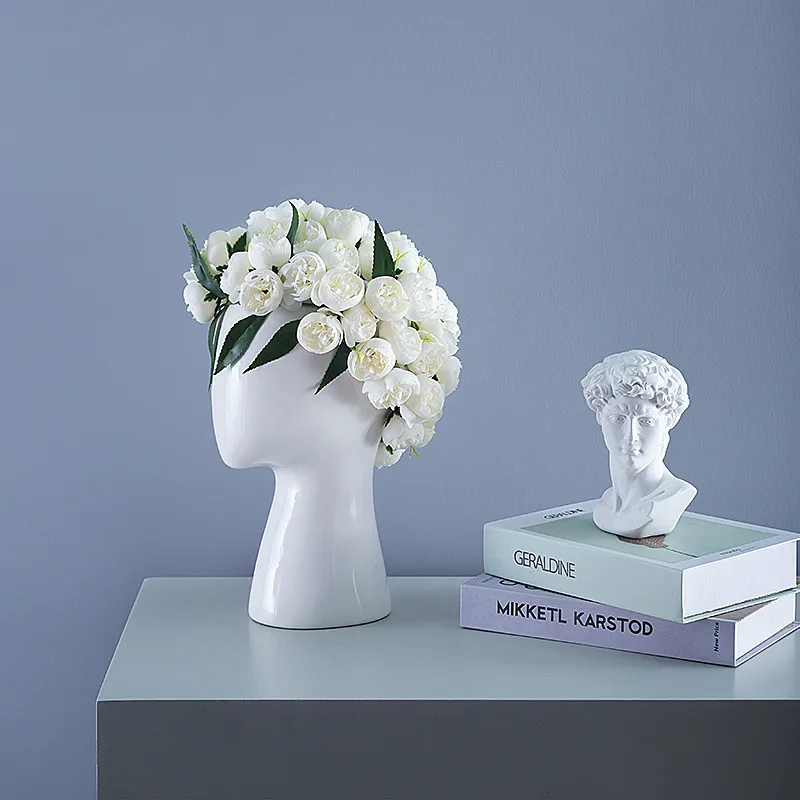 Nordic style Human model Ceramic vase Round hole Flower arrangement Home living room Decoration
Nordic style Human model Ceramic vase Round hole Flower arrangement Home living room Decoration