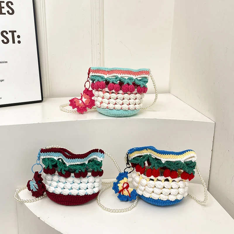 Сумка через плечо из вишневой пряжи, трехмерная полая сумка-ведро ручной работы, сумка через плечо с жемчужной цепочкой
Сумка через плечо из вишневой пряжи, трехмерная полая сумка-ведро ручной работы, сумка через плечо с жемчужной цепочкой